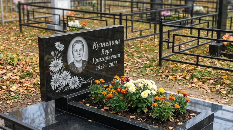 Памятник с гравировкой ромашек — выполненная работа «Кузнецова» в Пензе