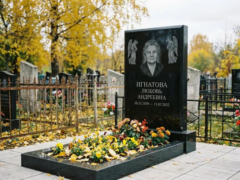 Памятник с гравировкой ангела — гравировка двух ангелов по сторонам портрета, работа «Игнатова» в Пензе